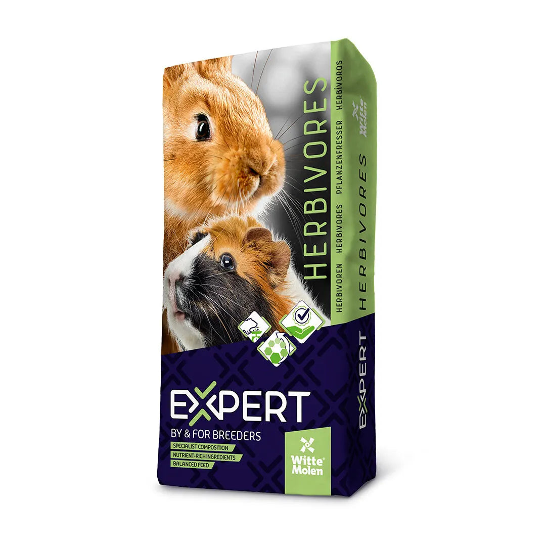 A bag of White Molen Expert Herbivores rabbit and guinea pig starter feed, featuring photos of a rabbit and guinea pig on the front, with green and dark purple packaging.